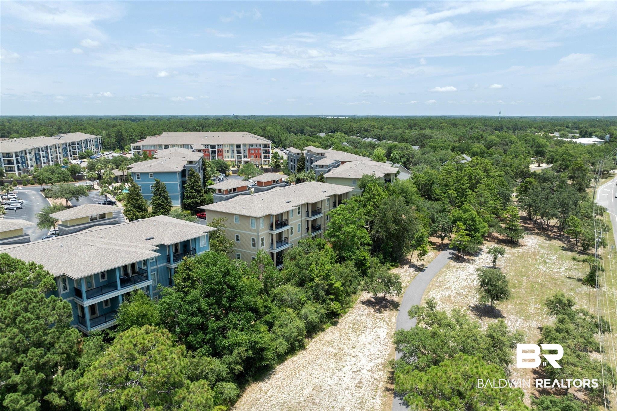 1430 Regency Road, Unit C103 Gulf Shores, AL 36542 - Photo 24 of 29 Bird's eye view of a heavily wooded area