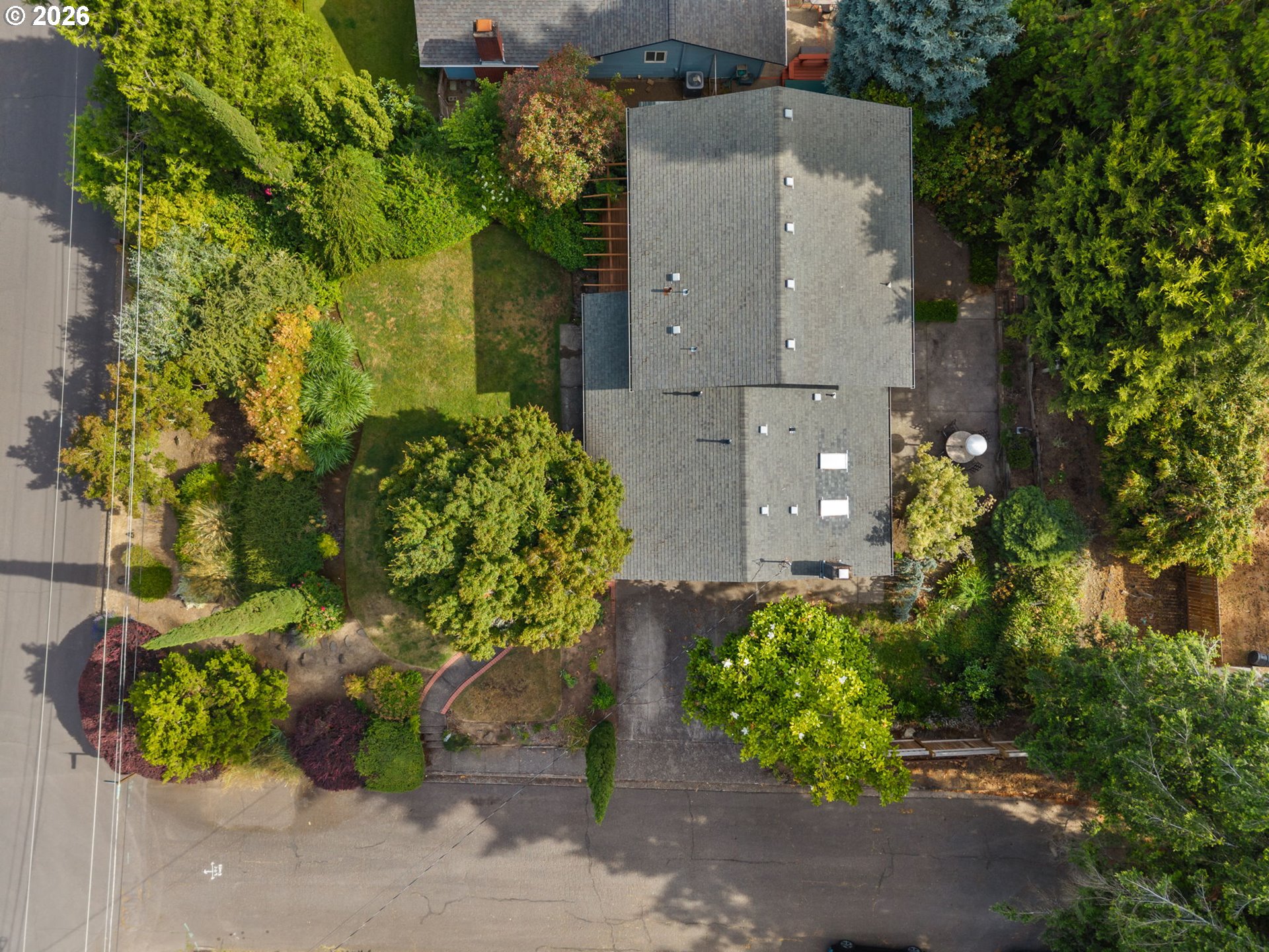 1995 Greiner Street Eugene, OR 97405 - Photo 36 of 39 an aerial view of a house with a yard and garden
