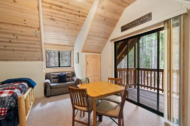 a view of swimming pool with two chairs