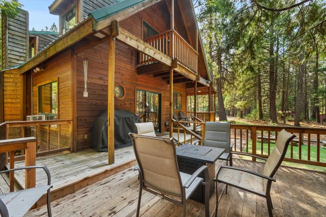 a view of a chairs and table in the patio