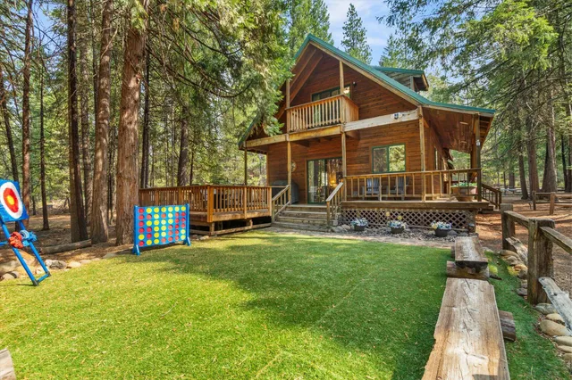 a view of backyard with trampoline