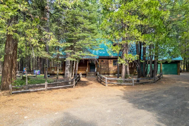 a backyard of a house with lots of green space