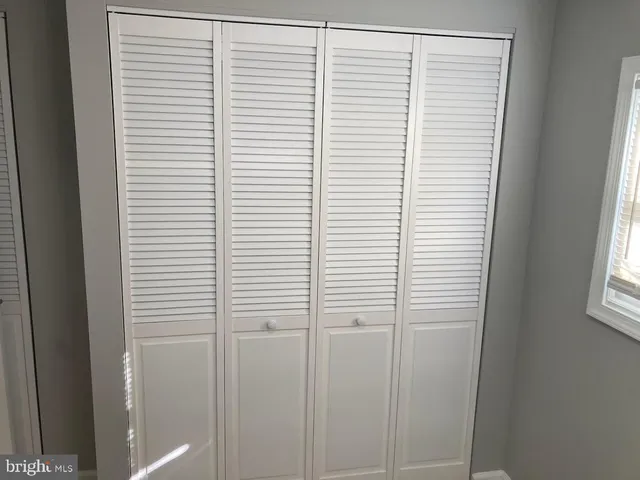 a view of a room that has a window