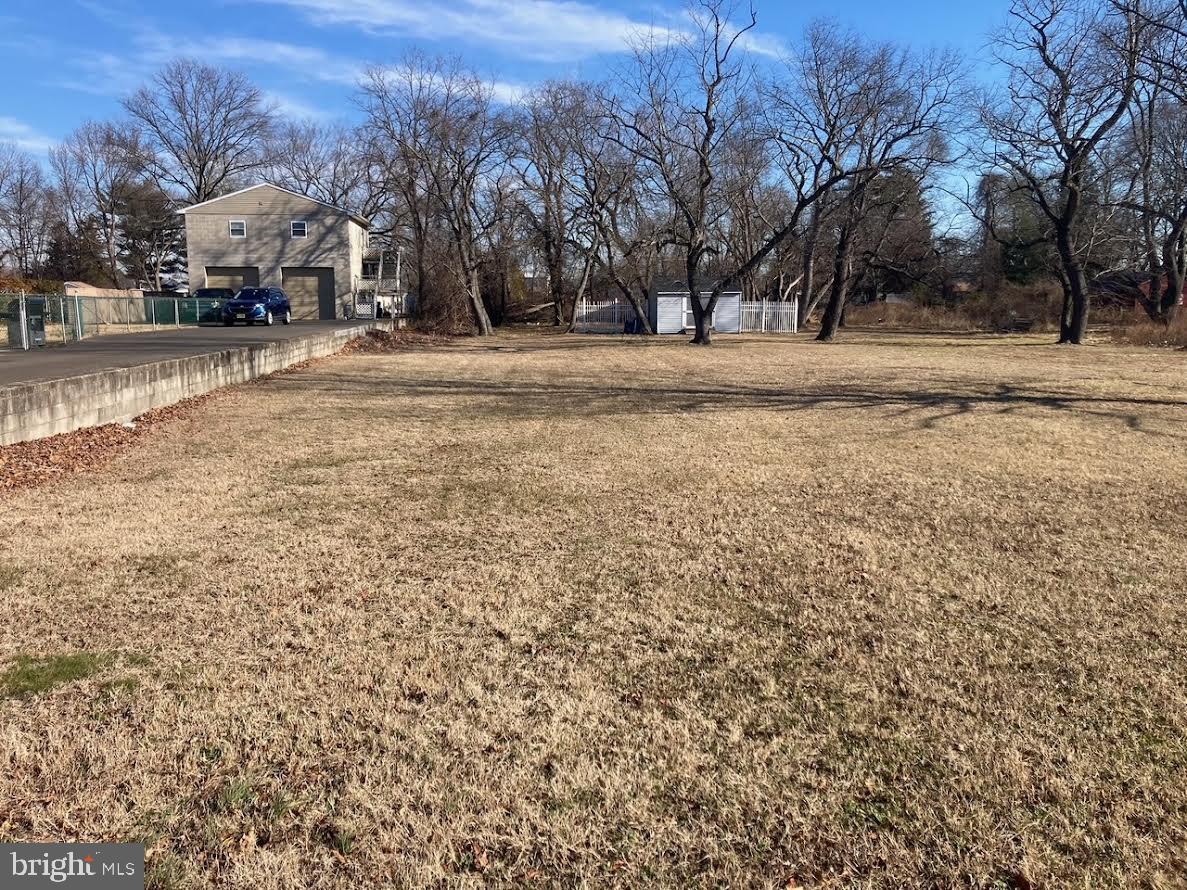 72 Alden Avenue Riverside, NJ 08075 - Photo 4 of 26 a view of road with with trees