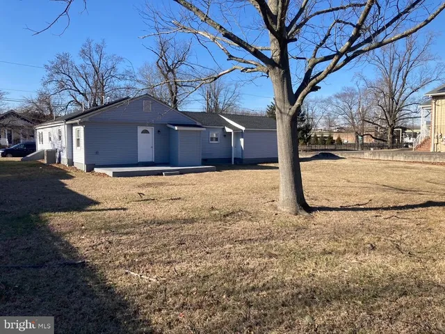 a view of a yard covered in snow