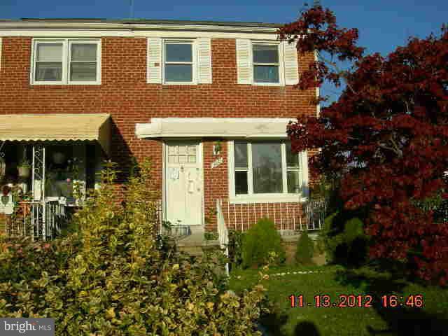 300 Torner Road Essex, MD 21221 - Photo 1 of 10 a front view of a house with a yard