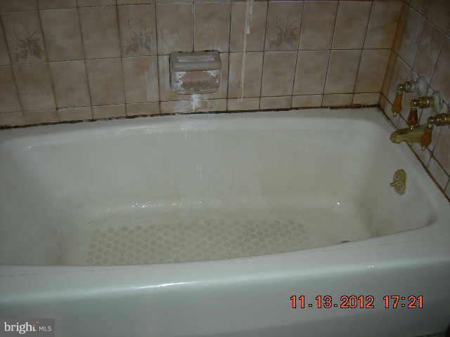 300 Torner Road Essex, MD 21221 - Photo 6 of 10 a view of a bathtub