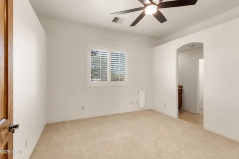 a view of house with backyard outdoor seating and entertaining space