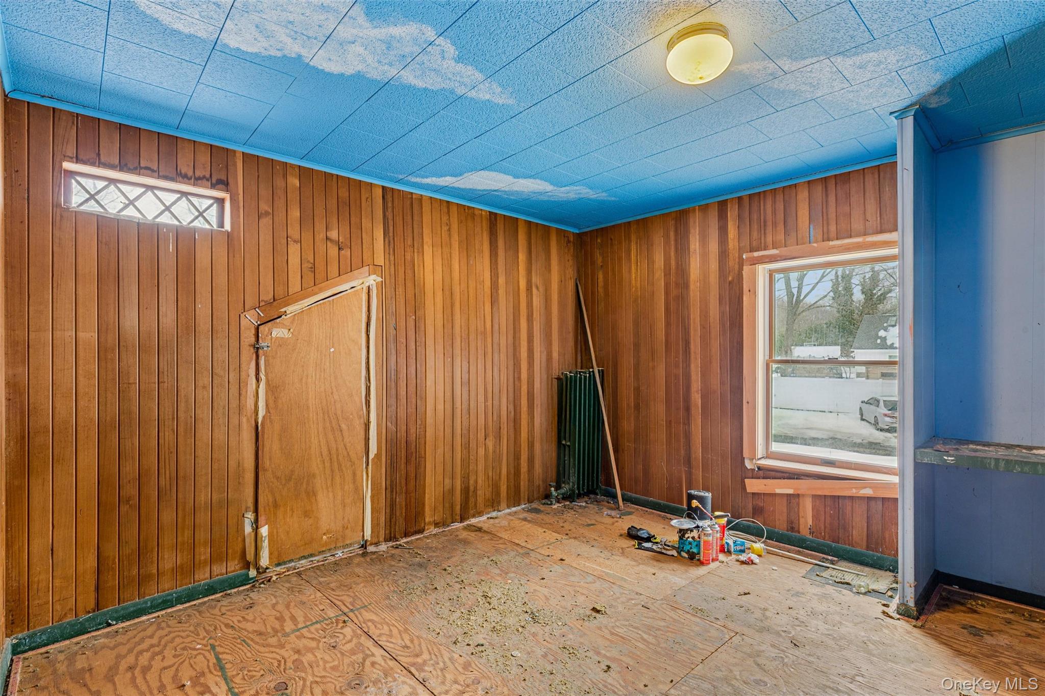 250 Main Road Riverhead, NY 11901 - Photo 23 of 31 a view of a room with a window and storage