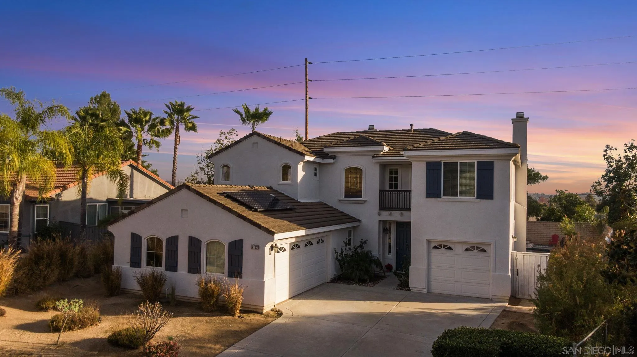 2103 Drew Road Escondido, CA 92027 - Photo 1 of 60 a front view of a house with a yard and garage