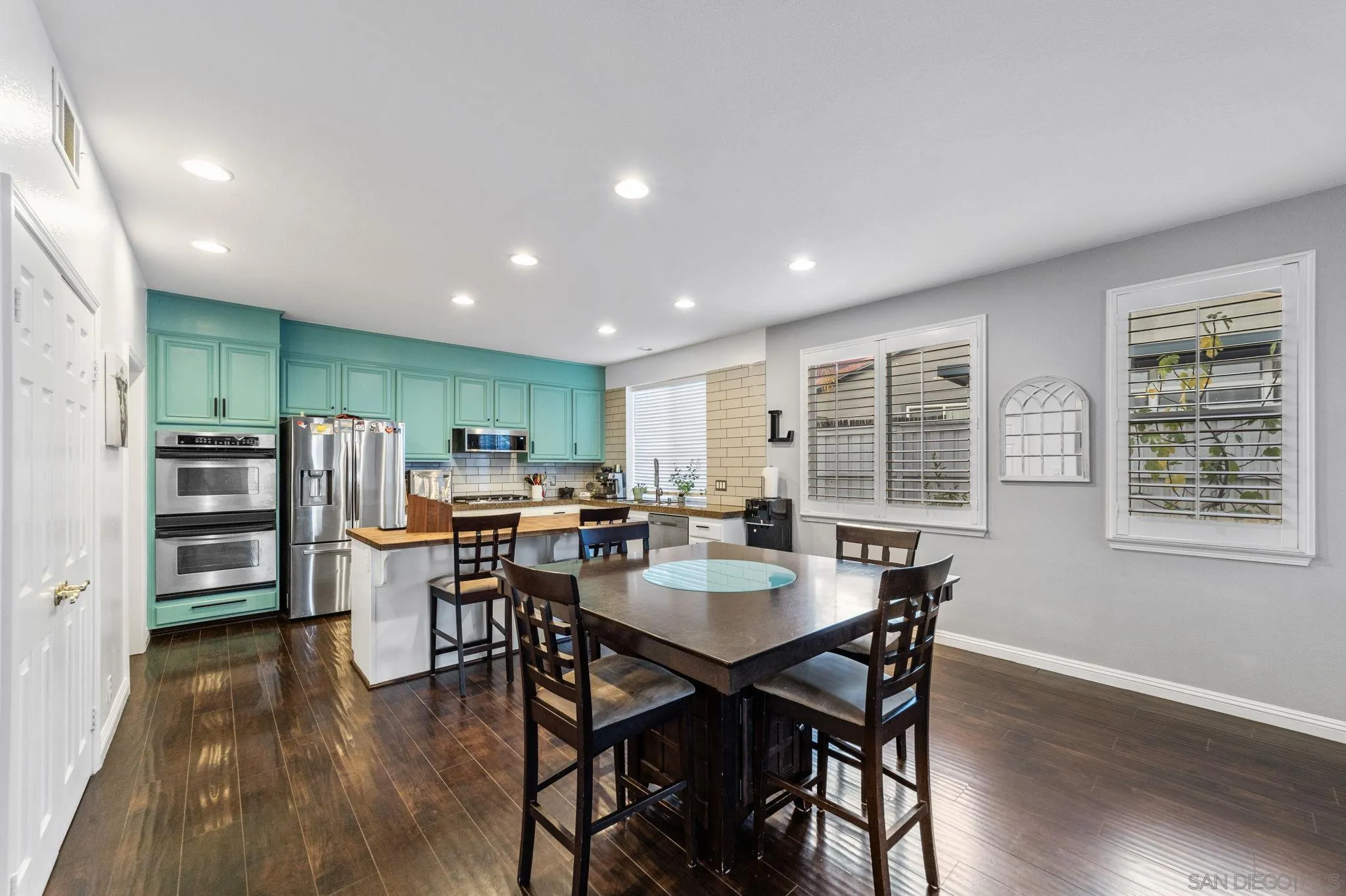 2103 Drew Road Escondido, CA 92027 - Photo 11 of 60 a view of a dining room with furniture window and wooden floor