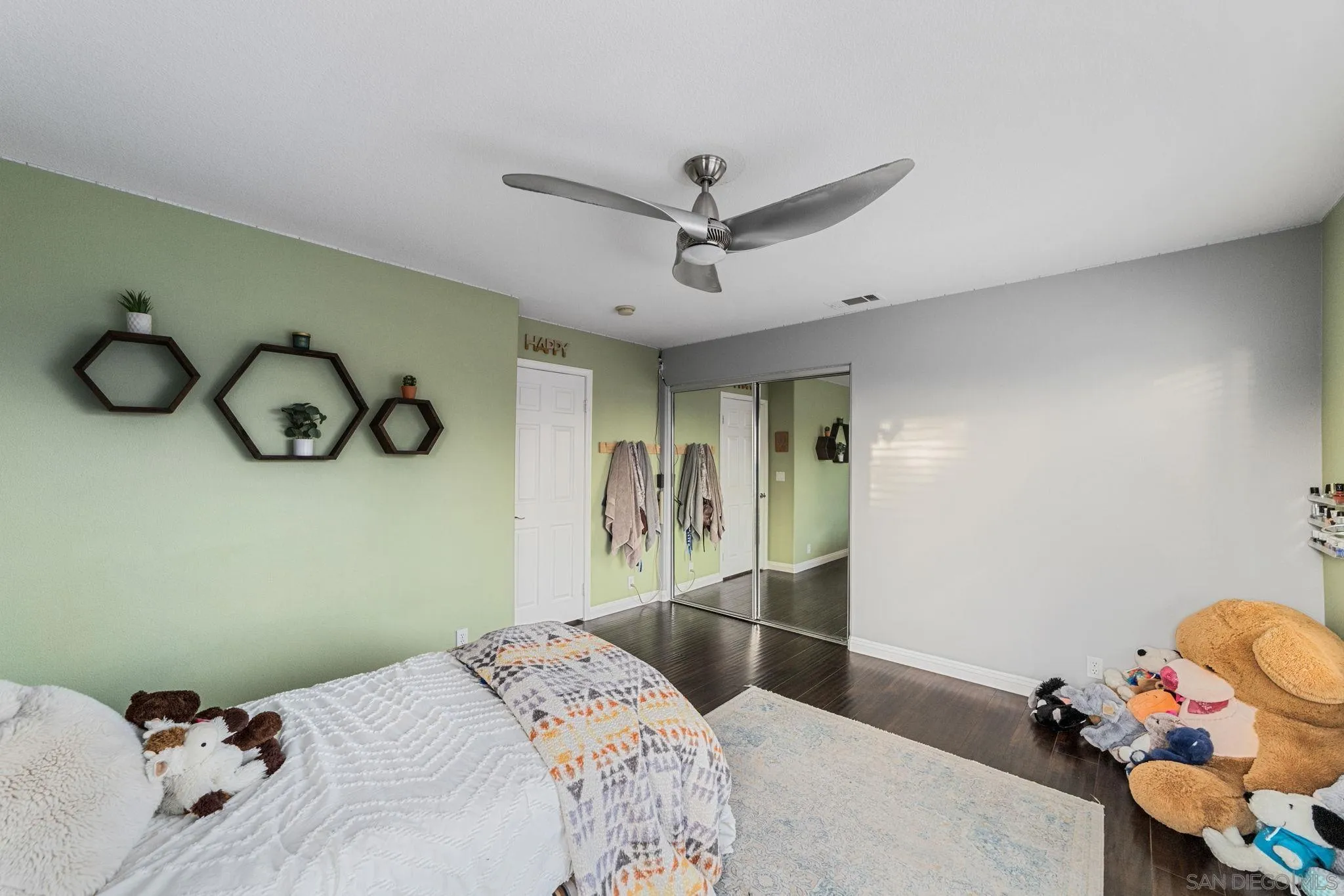 2103 Drew Road Escondido, CA 92027 - Photo 36 of 60 a bedroom with a bed and cabinets