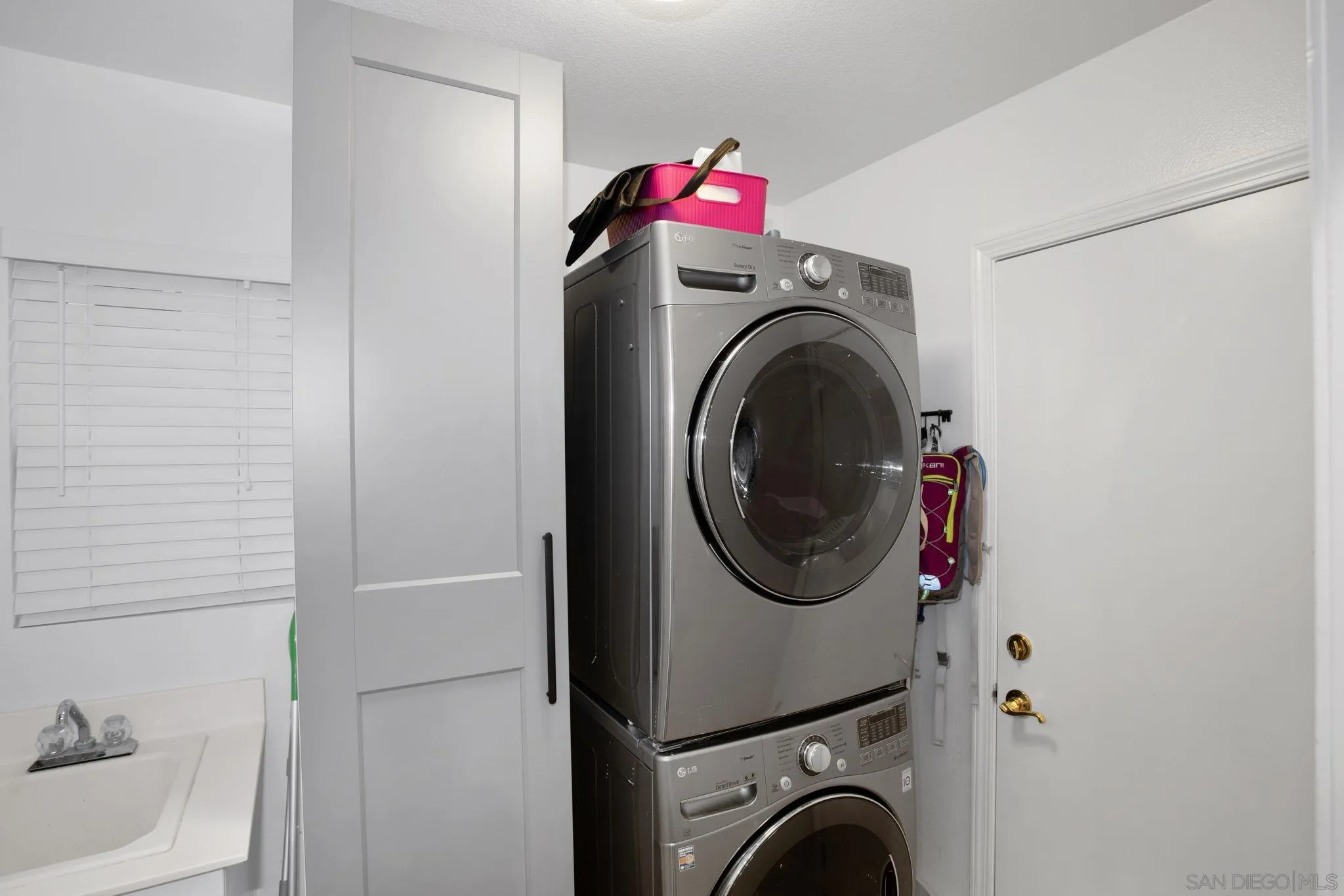 2103 Drew Road Escondido, CA 92027 - Photo 45 of 60 a utility room with dryer and washer