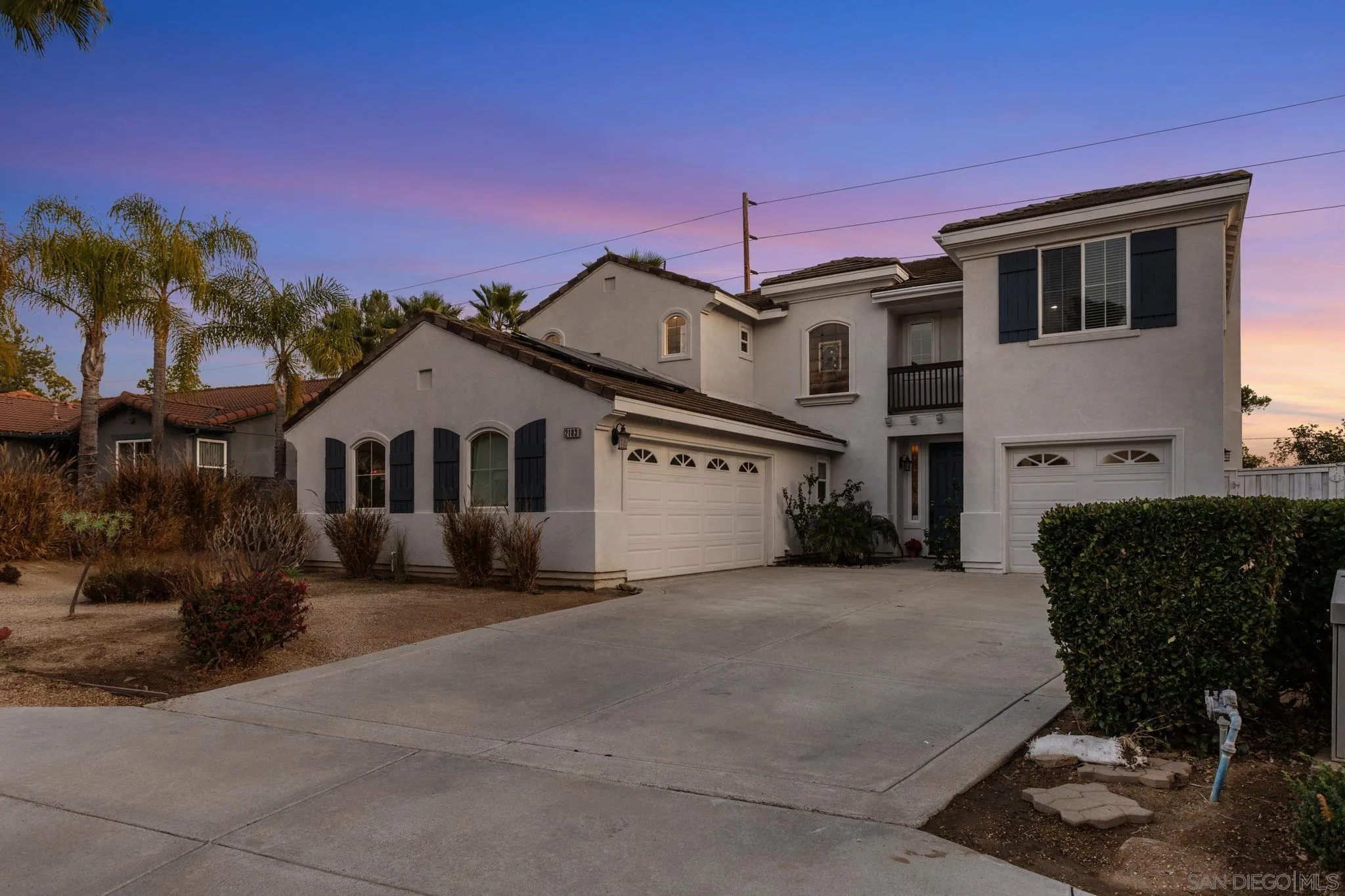 2103 Drew Road Escondido, CA 92027 - Photo 49 of 60 a front view of a house with a yard