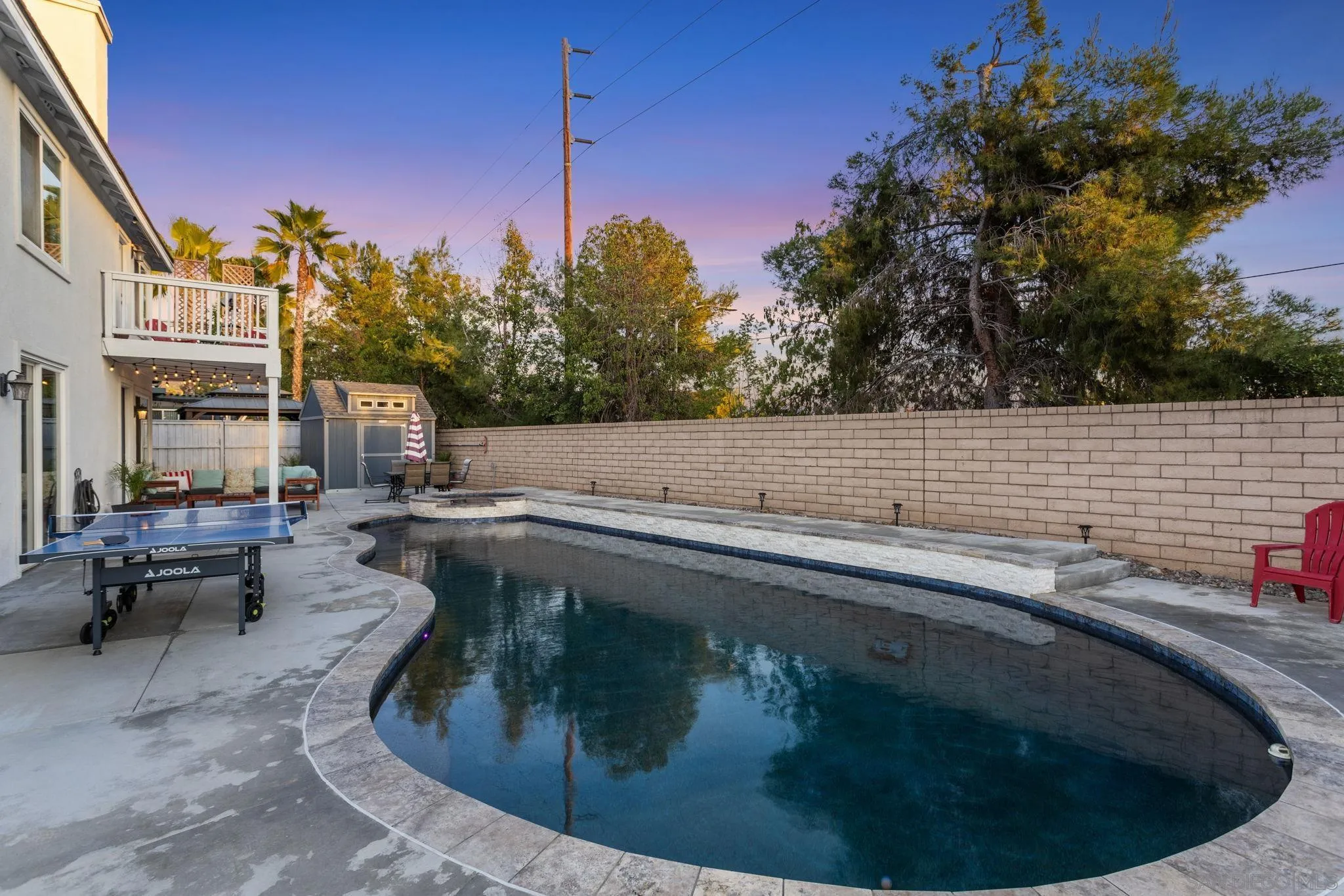 2103 Drew Road Escondido, CA 92027 - Photo 5 of 60 a view of a swimming pool with sitting area