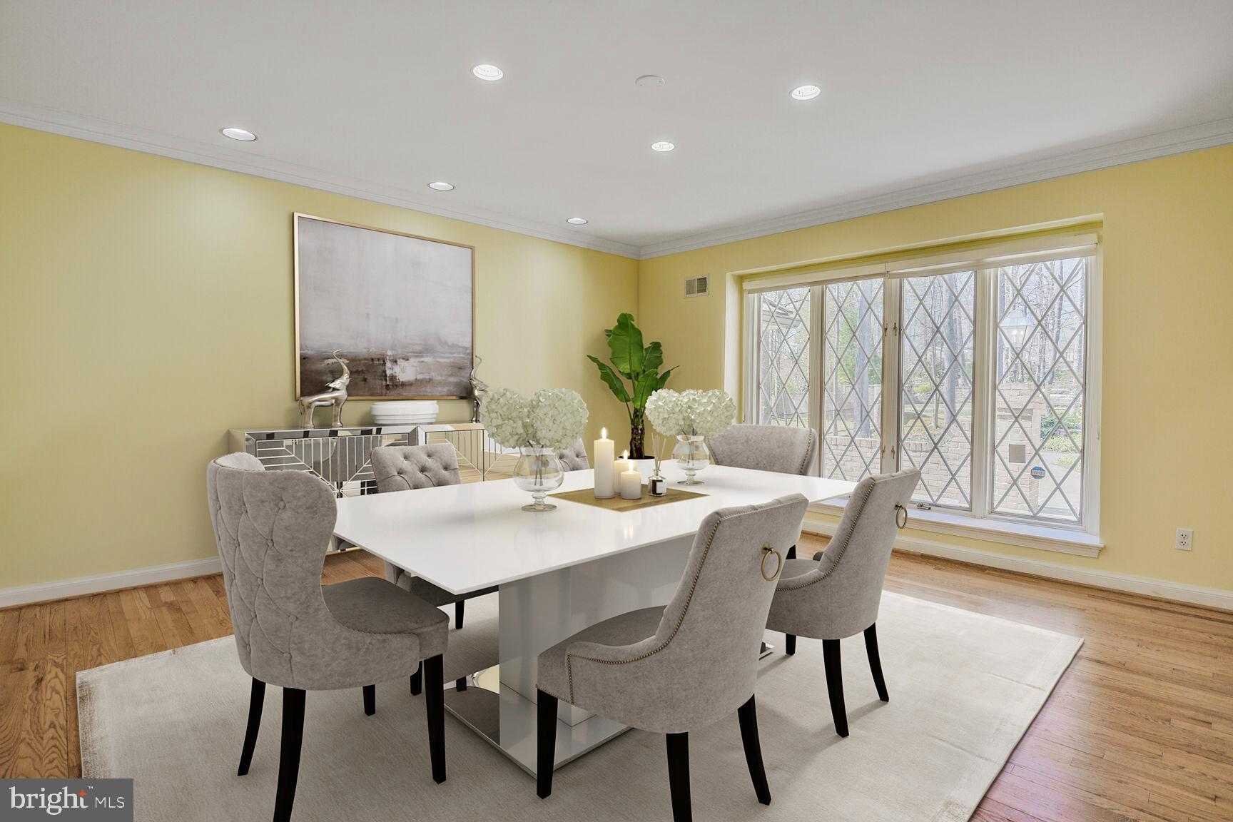 10101 Bentcross Drive Potomac, MD 20854 - Photo 11 of 44 a view of a dining room with furniture and wooden floor