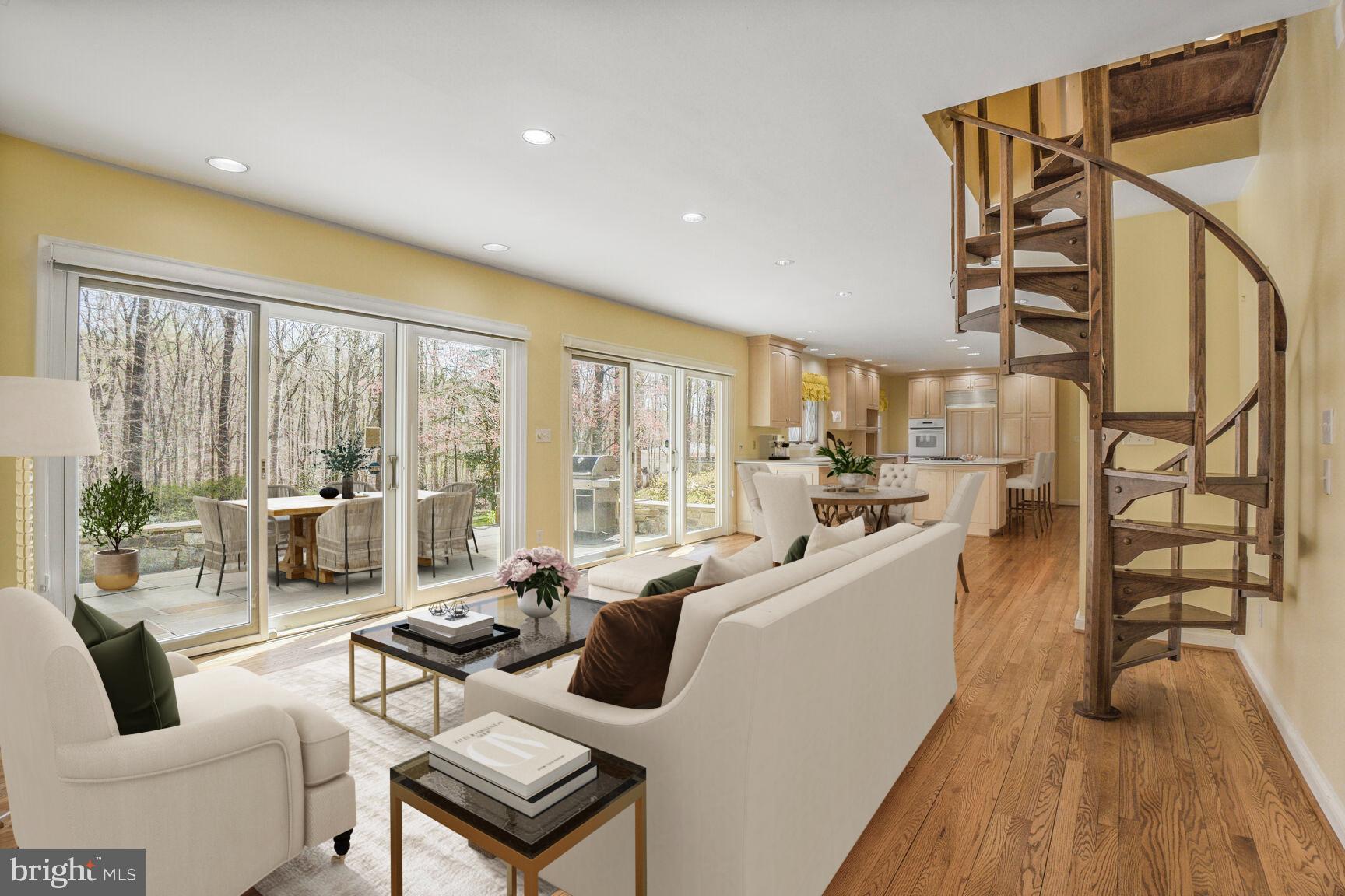 10101 Bentcross Drive Potomac, MD 20854 - Photo 15 of 44 a living room with furniture a large window with wooden floor
