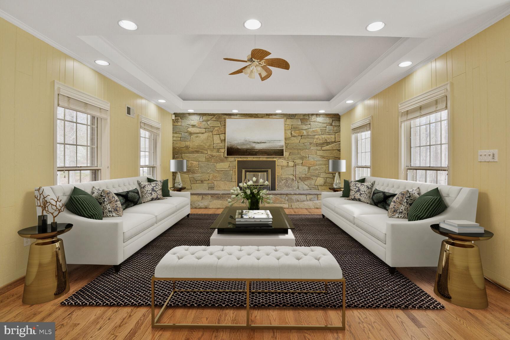 10101 Bentcross Drive Potomac, MD 20854 - Photo 18 of 44 a living room with furniture or couch and a fireplace