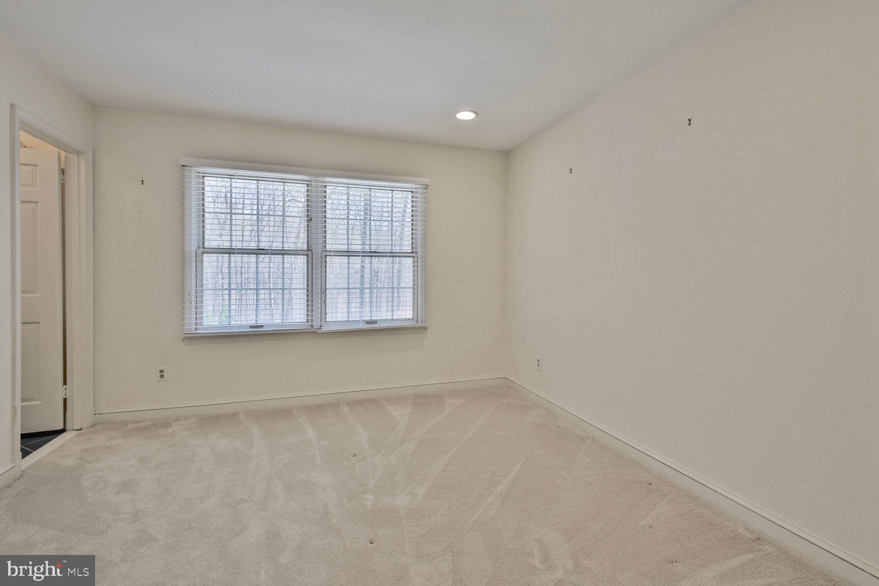 10101 Bentcross Drive Potomac, MD 20854 - Photo 27 of 44 an empty room with a window
