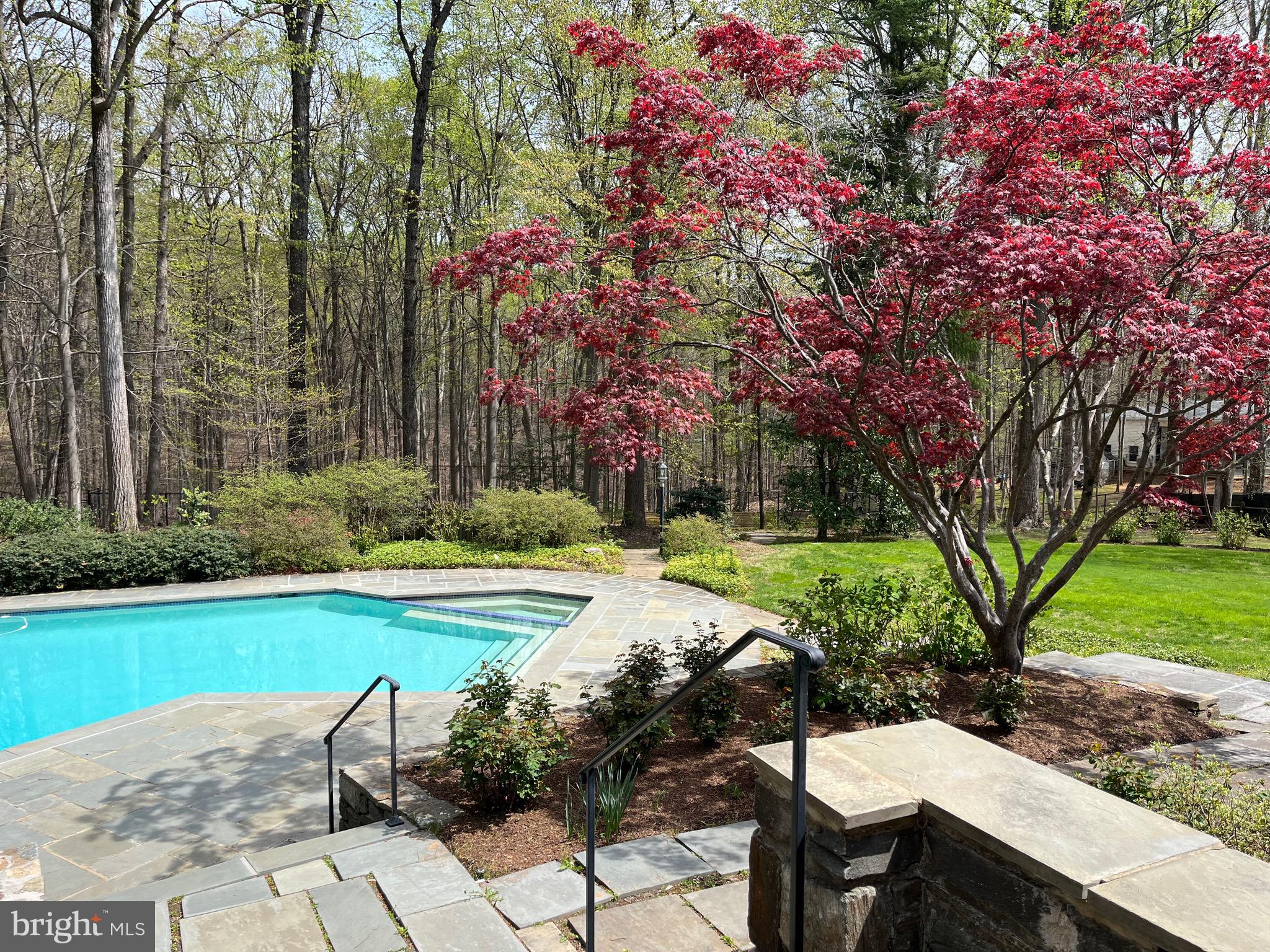 10101 Bentcross Drive Potomac, MD 20854 - Photo 36 of 44 a view of a chairs and table in the garden