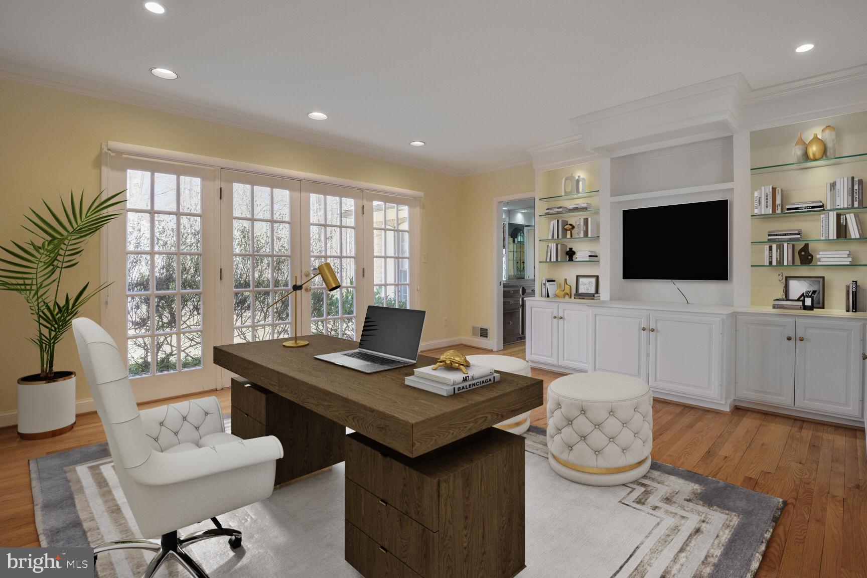 10101 Bentcross Drive Potomac, MD 20854 - Photo 9 of 44 a living room with furniture and a flat screen tv