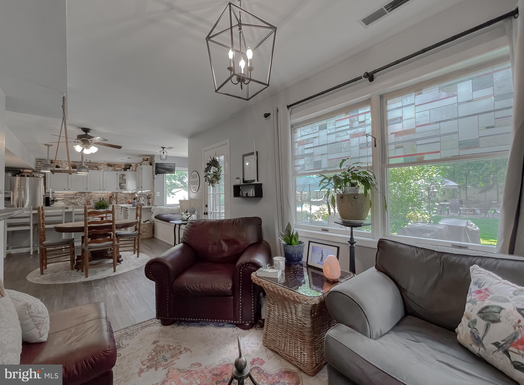 22338 White Oak Road Leonardtown, MD 20650 - Photo 15 of 66 a living room with furniture and a large window
