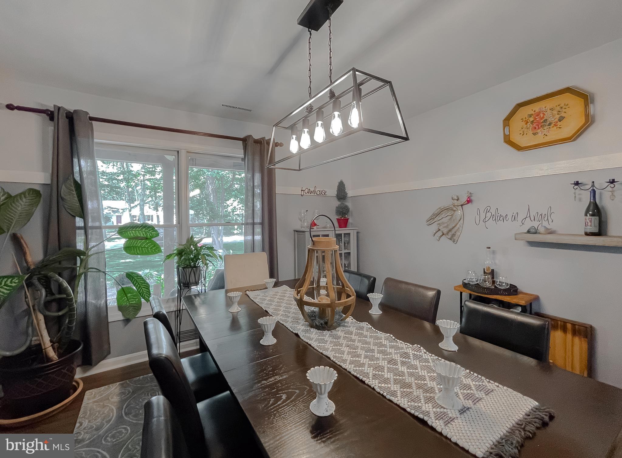 22338 White Oak Road Leonardtown, MD 20650 - Photo 27 of 66 a view of a dining room with furniture window and outside view