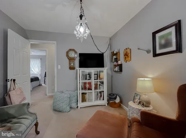 a utility room with closet dryer and washer