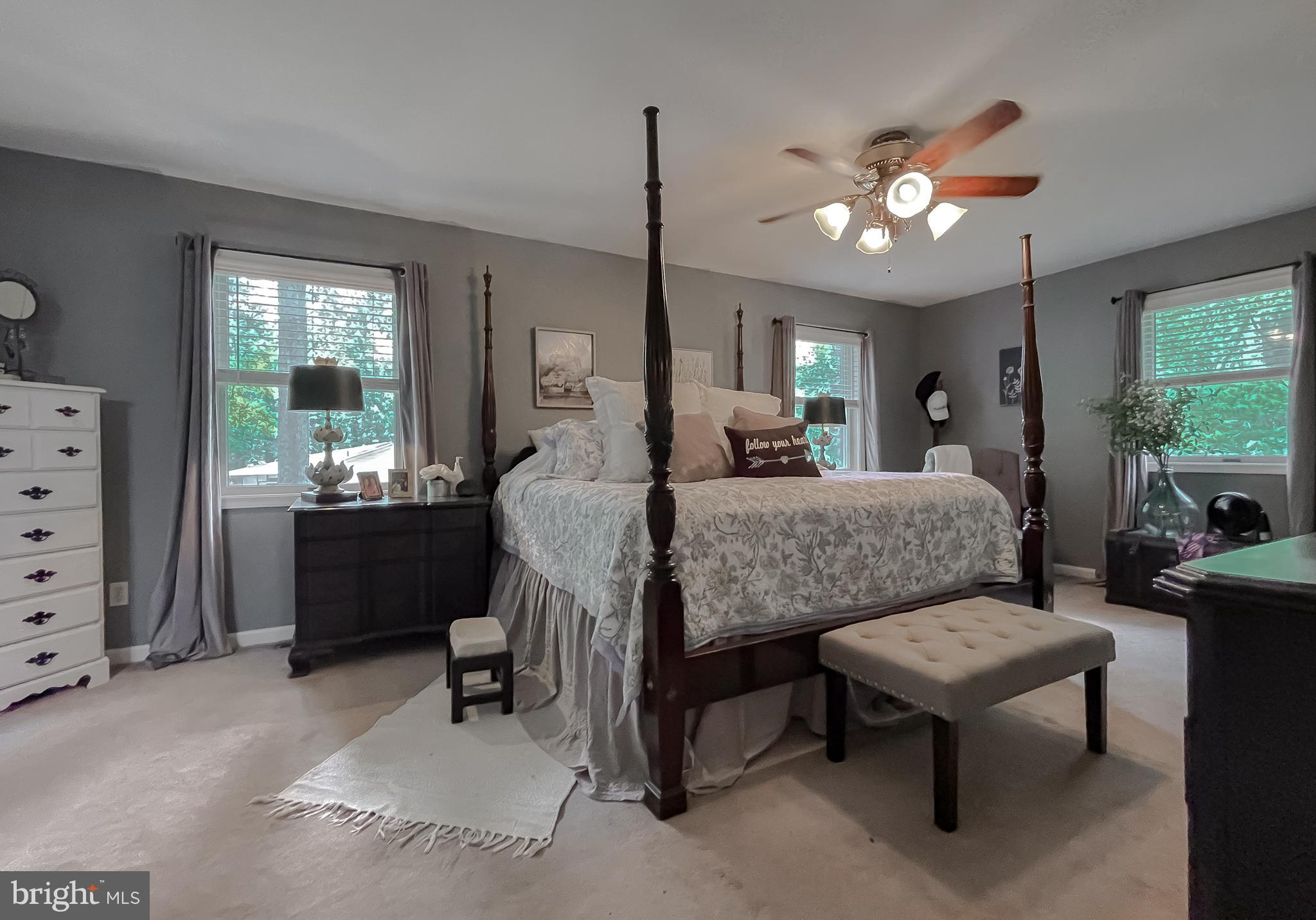 22338 White Oak Road Leonardtown, MD 20650 - Photo 41 of 66 a living room with furniture and chandelier