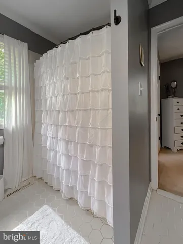 a view of a swimming pool with an outdoor space and seating area