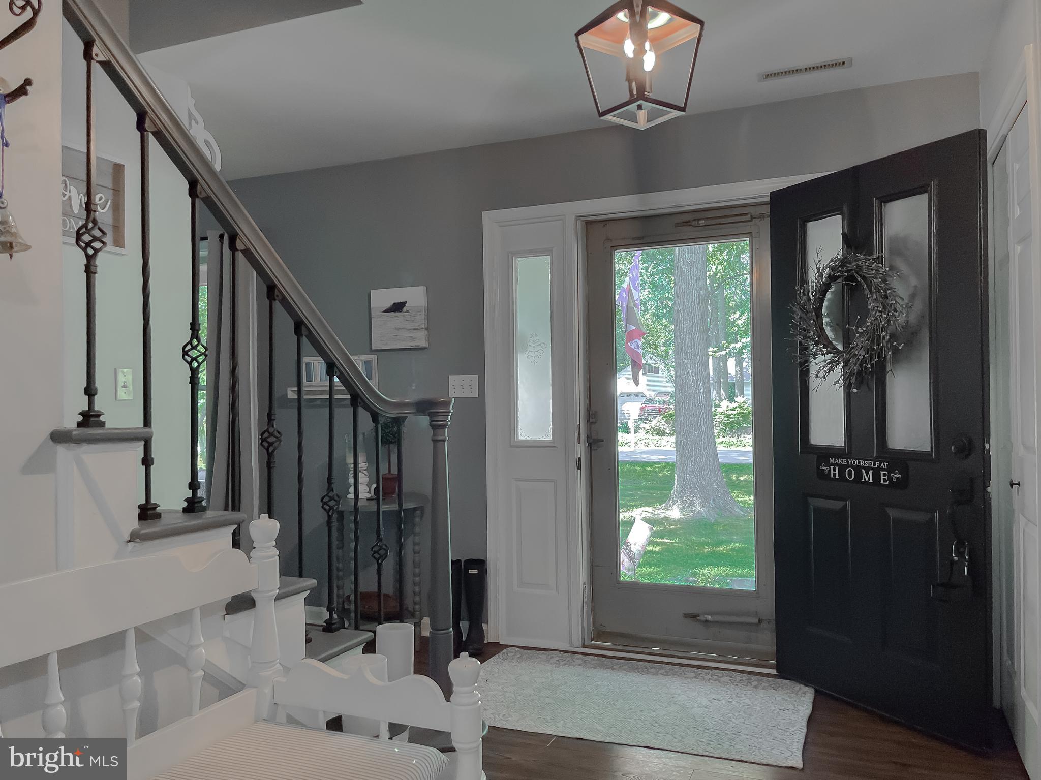 22338 White Oak Road Leonardtown, MD 20650 - Photo 6 of 66 a view of a livingroom with furniture window and front door