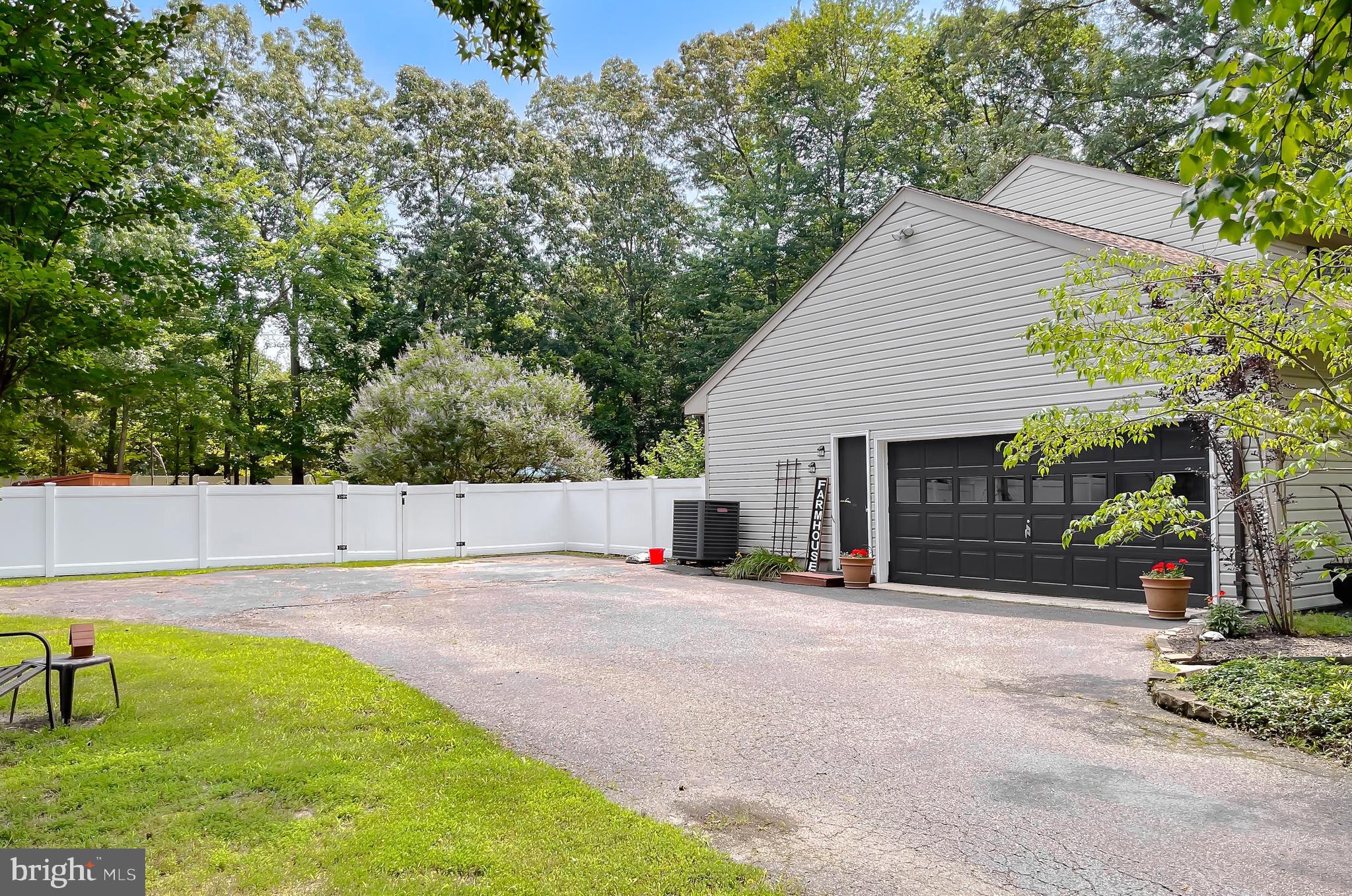 22338 White Oak Road Leonardtown, MD 20650 - Photo 66 of 66 a view of a backyard with a small cabin