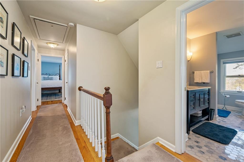 104 Ascot Place Pittsburgh, PA 15237 - Photo 12 of 26 a view of a hallway with wooden floor and living room