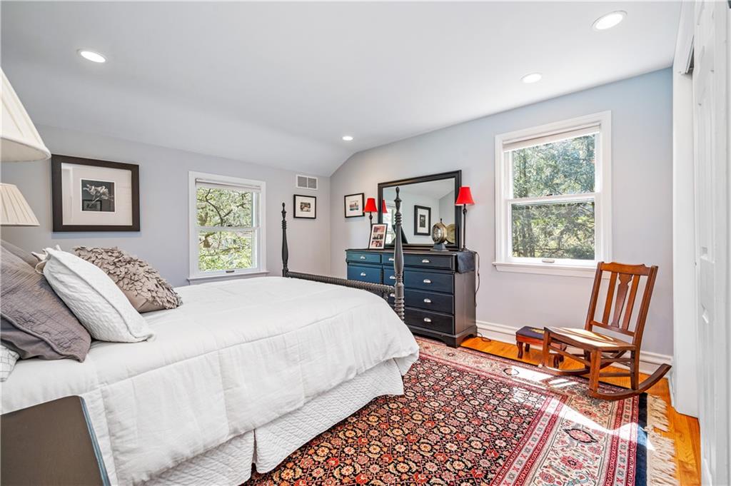 104 Ascot Place Pittsburgh, PA 15237 - Photo 14 of 26 a bed room with a bed and a chair