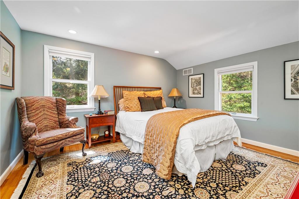 104 Ascot Place Pittsburgh, PA 15237 - Photo 15 of 26 a bed sitting in a bedroom next to a window