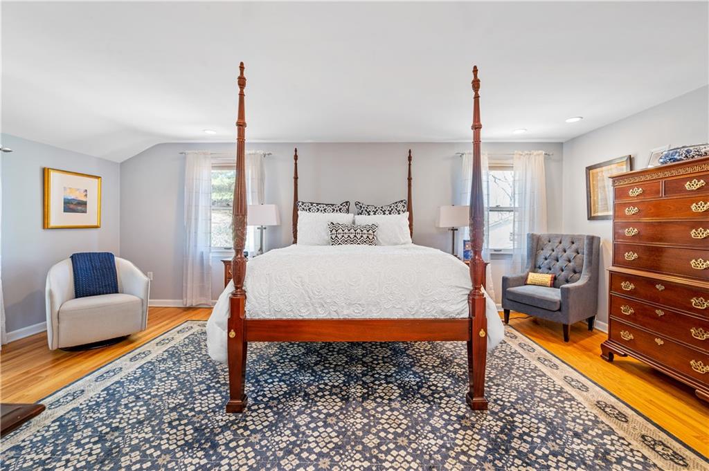 104 Ascot Place Pittsburgh, PA 15237 - Photo 16 of 26 a bedroom with a bed and a couch