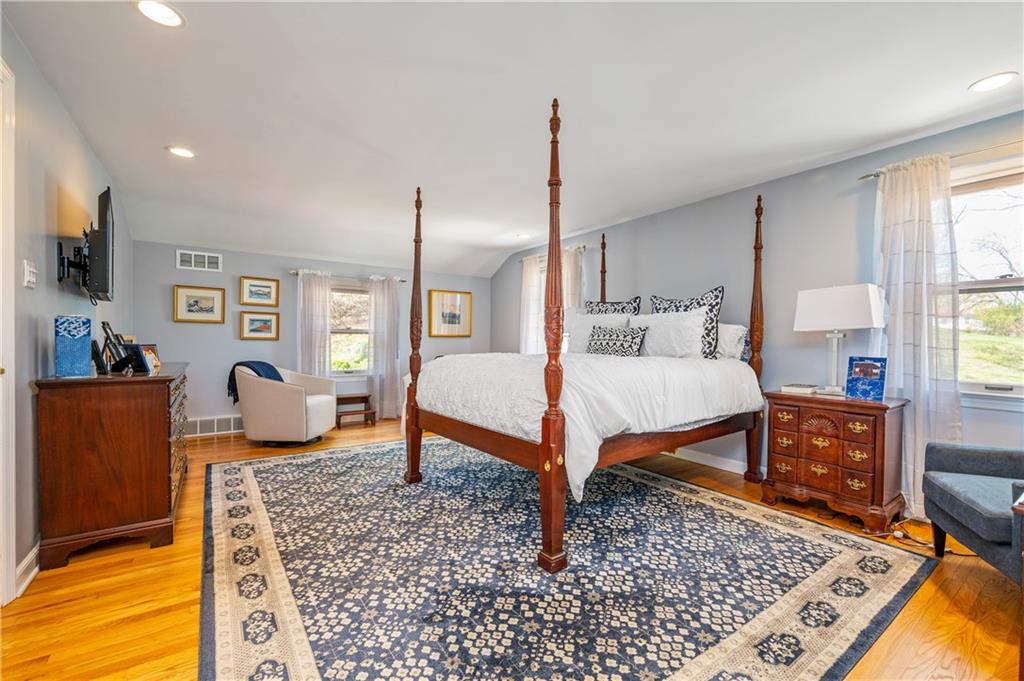 104 Ascot Place Pittsburgh, PA 15237 - Photo 17 of 26 a bedroom with furniture rug and wooden floor