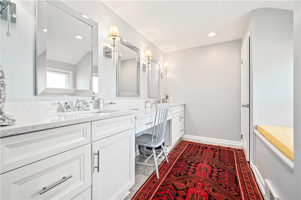 104 Ascot Place Pittsburgh, PA 15237 - Photo 19 of 26 a spacious bathroom with a sink and a mirror