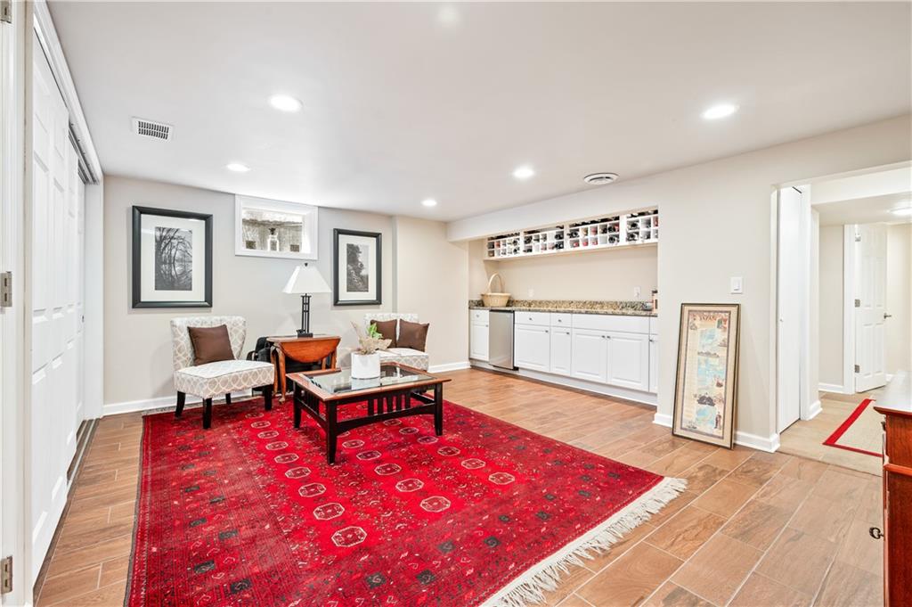 104 Ascot Place Pittsburgh, PA 15237 - Photo 21 of 26 a living room with furniture rug and wooden floor