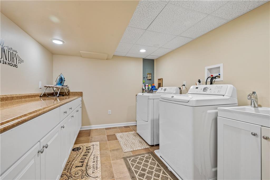 104 Ascot Place Pittsburgh, PA 15237 - Photo 22 of 26 a utility room with sink dryer and washer