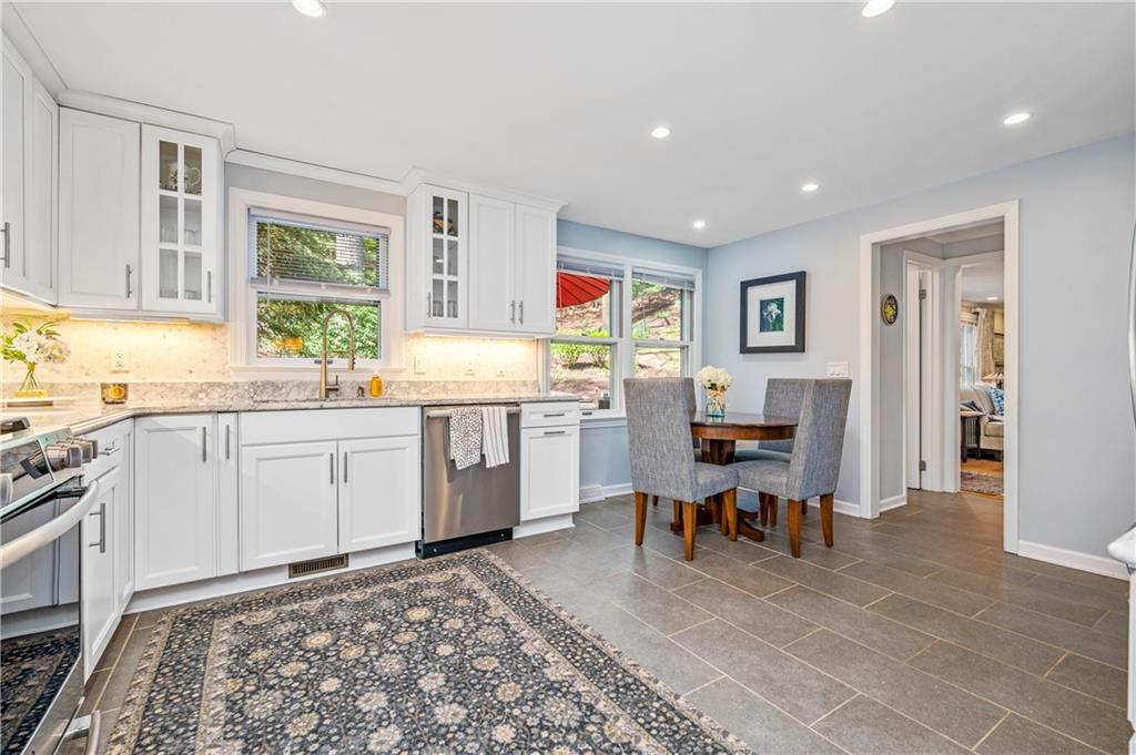 104 Ascot Place Pittsburgh, PA 15237 - Photo 4 of 26 a view of a kitchen and dining room