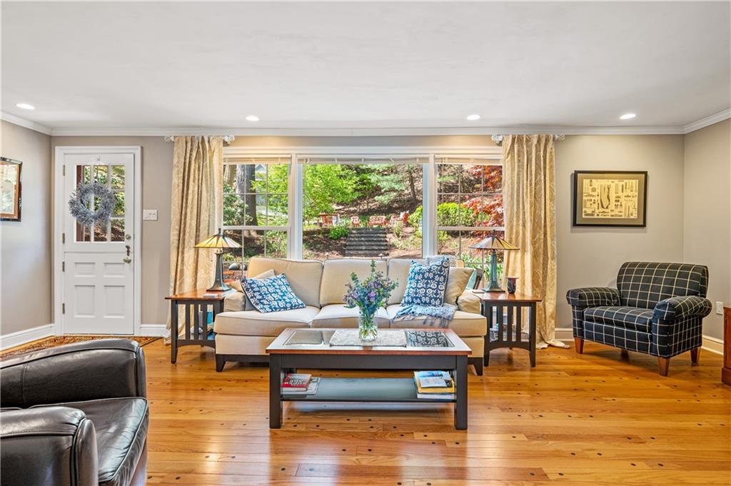 104 Ascot Place Pittsburgh, PA 15237 - Photo 9 of 26 a living room with furniture and a large window