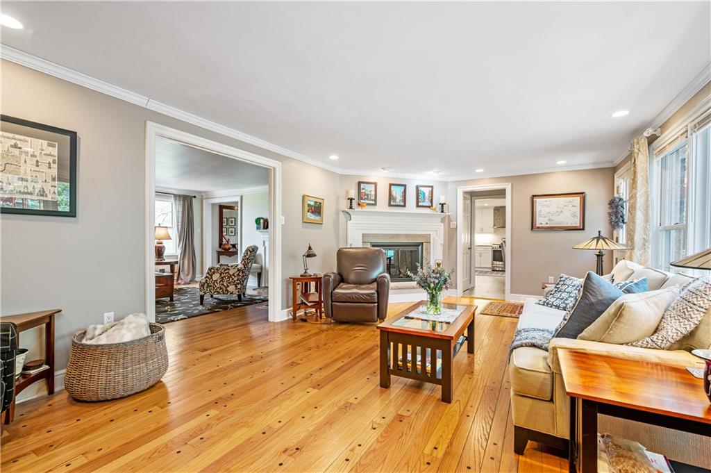 104 Ascot Place Pittsburgh, PA 15237 - Photo 10 of 26 a living room with furniture and a wooden floor