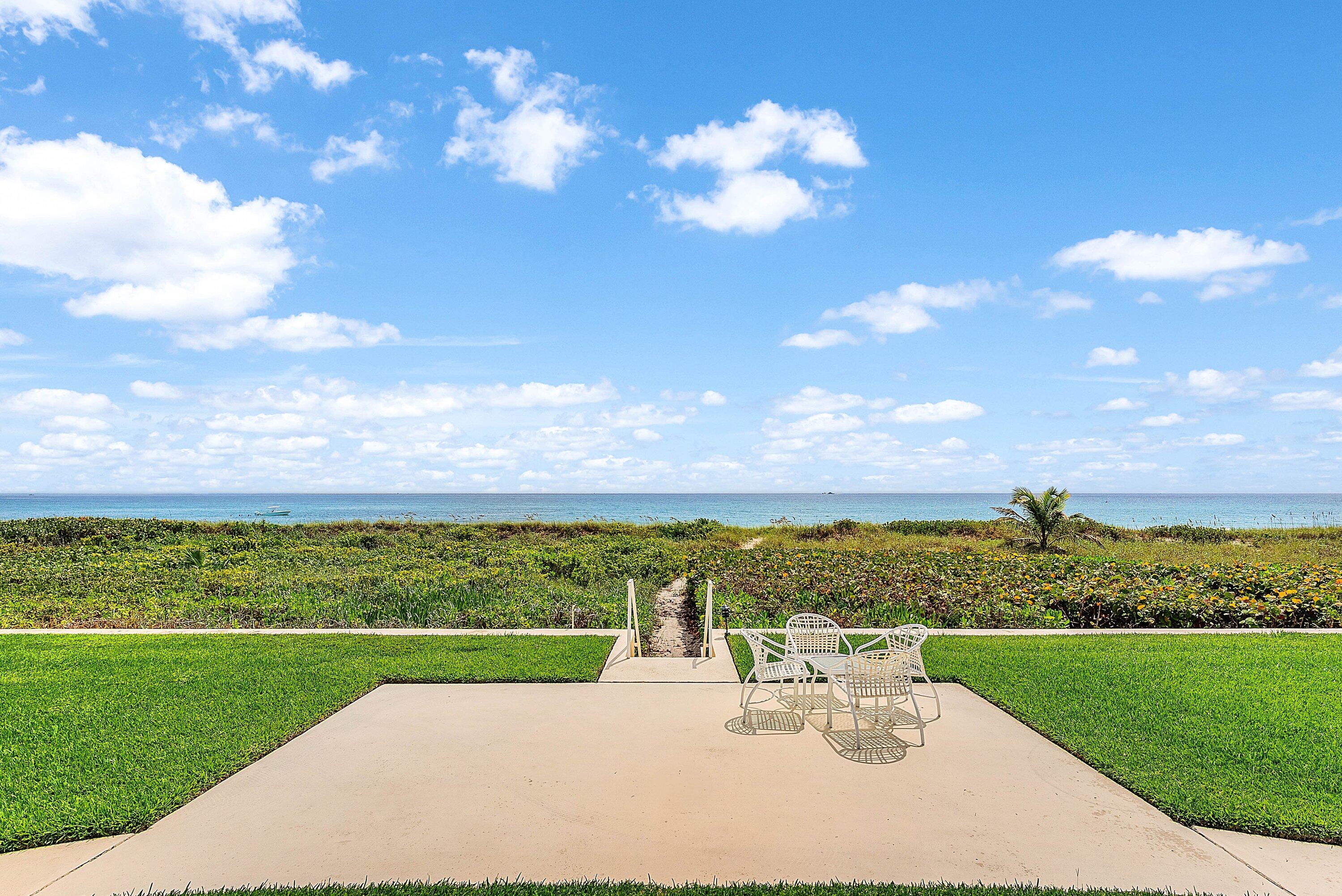 2103 South Ocean Boulevard, Unit 4B Delray Beach, FL 33483 - Photo 27 of 46 a view of a lake with a houses