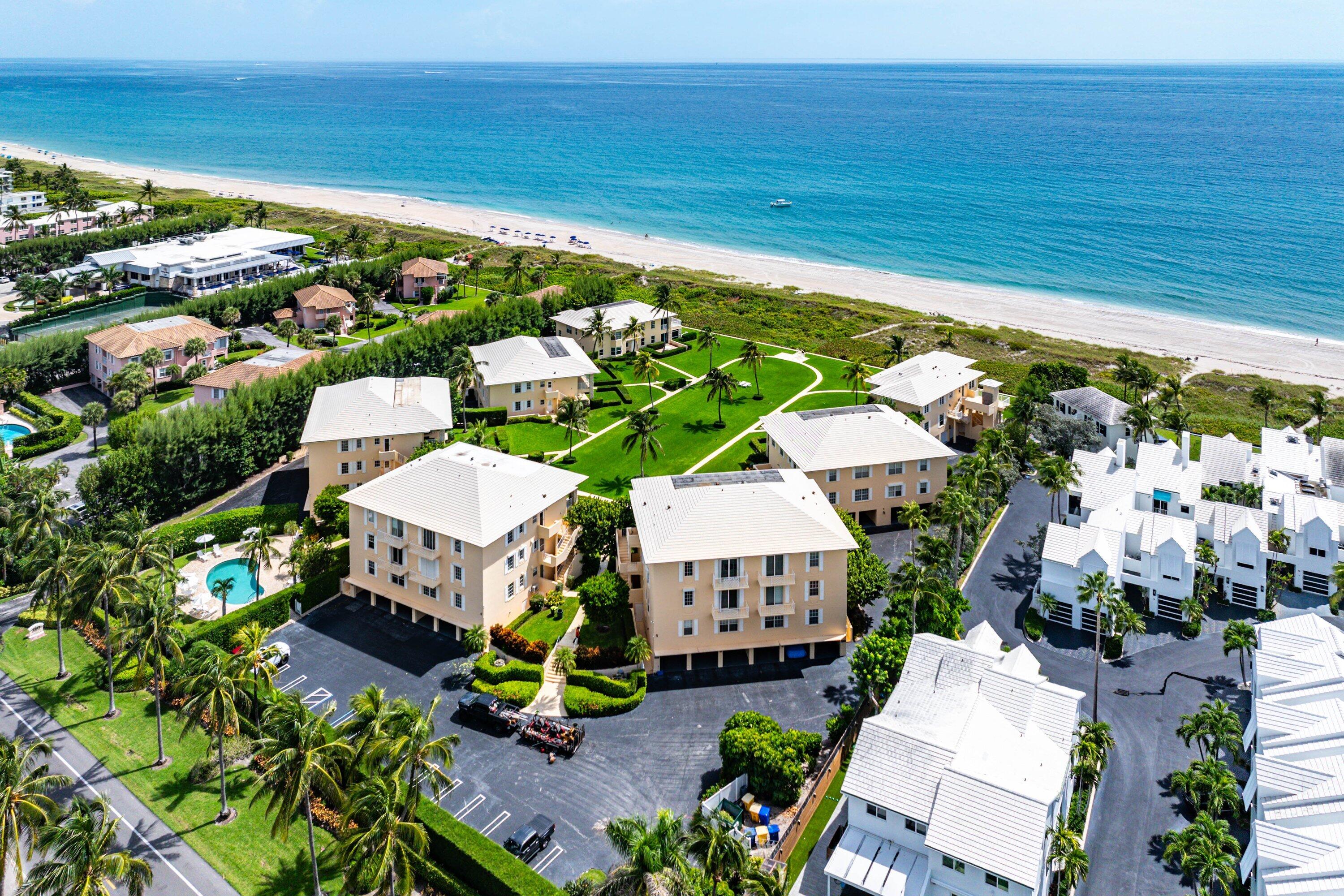 2103 South Ocean Boulevard, Unit 4B Delray Beach, FL 33483 - Photo 38 of 46 a view of a house with a patio