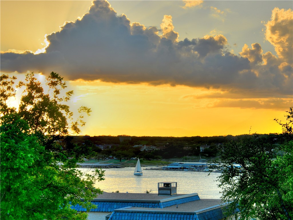 1008 Challenger Lakeway, TX 78734 - Photo 1 of 1 a view of swimming pool and mountain
