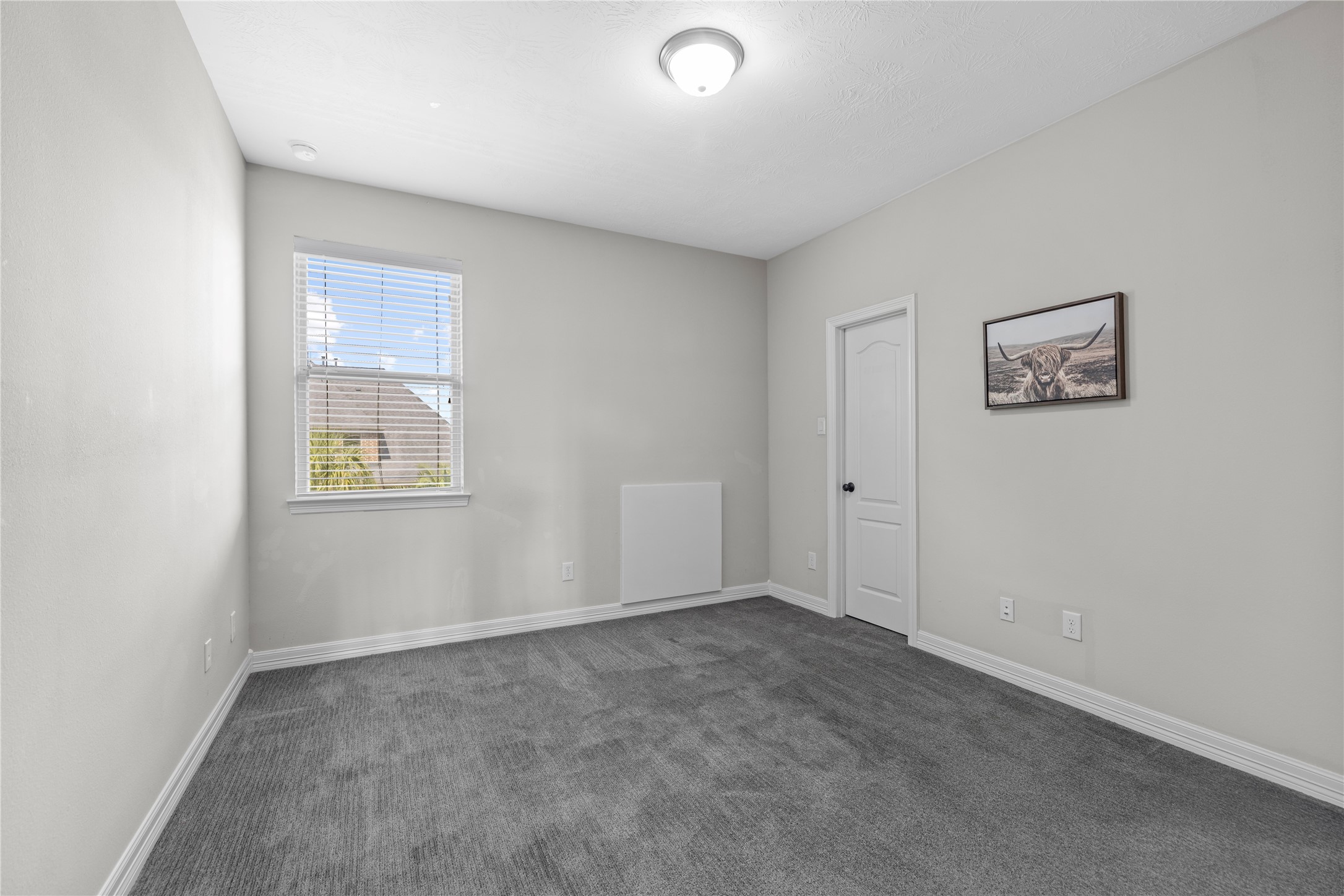27506 Windcrest Key Lane Fulshear, TX 77441 - Photo 26 of 30 an empty room with a window