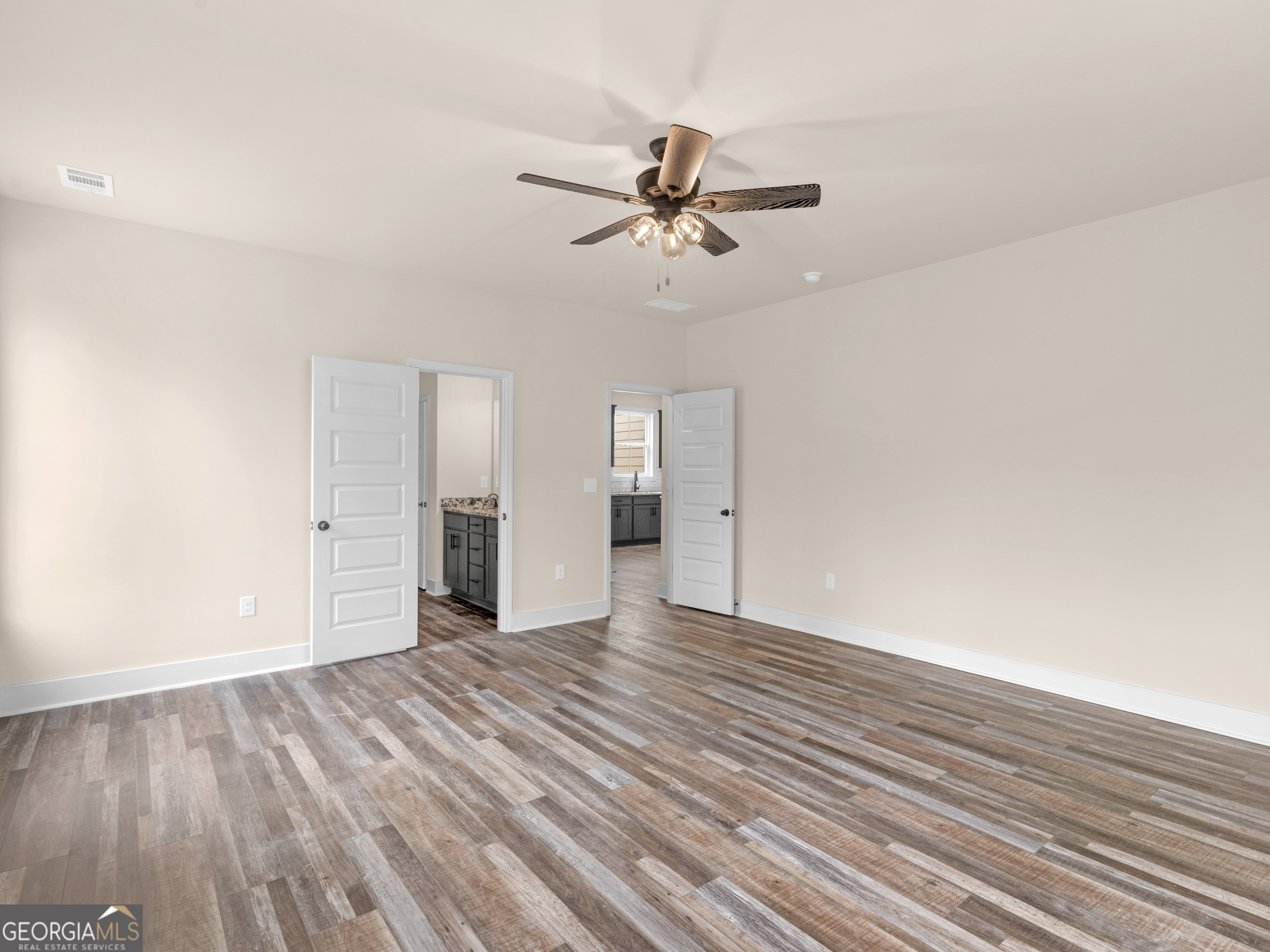 160 Loyd Road Mansfield, GA 30056 - Photo 43 of 53 a view of empty room with wooden floor