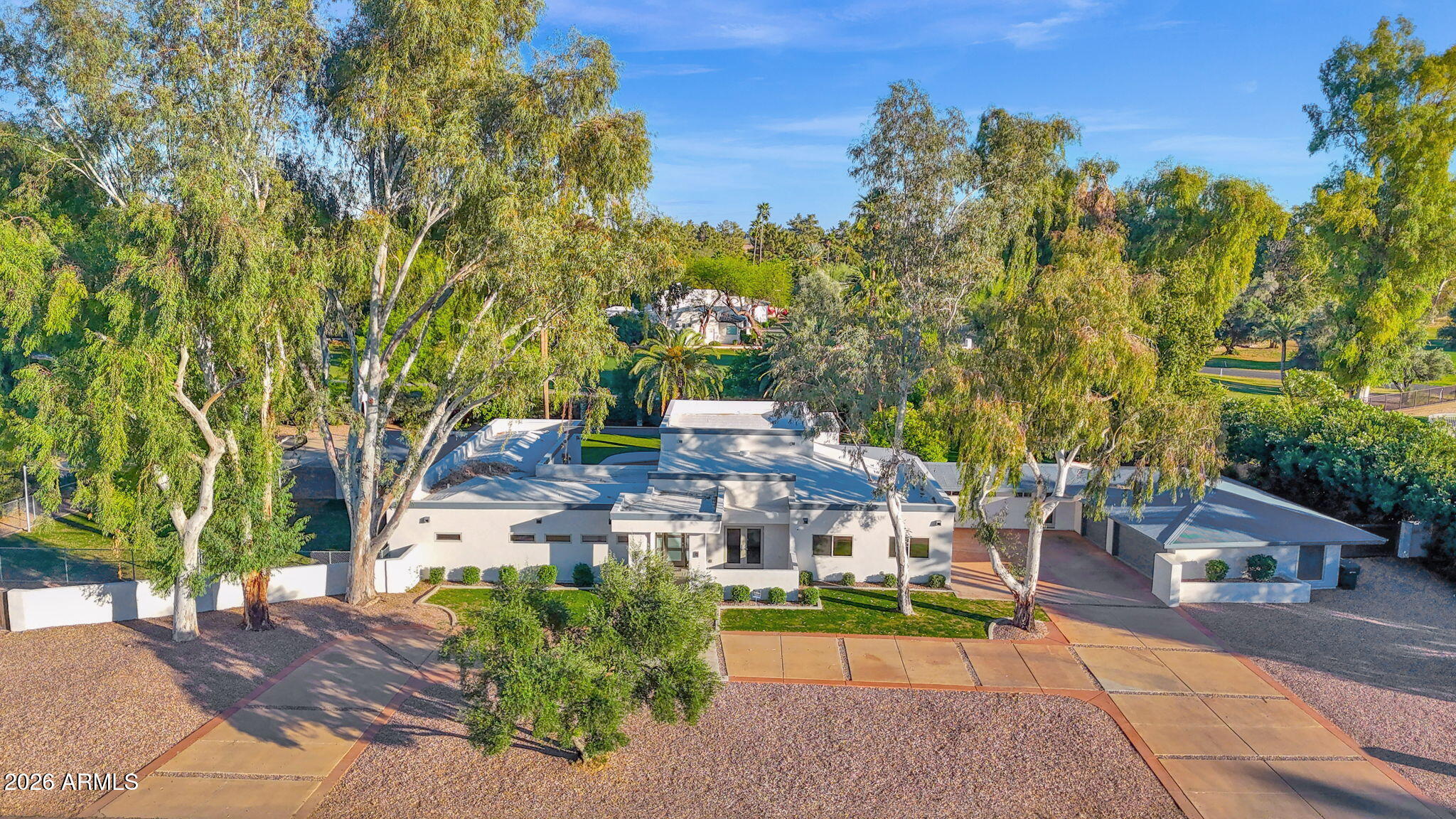 11813 North Blackheath Road Scottsdale, AZ 85254 - Photo 1 of 55 a view of a city with tall trees