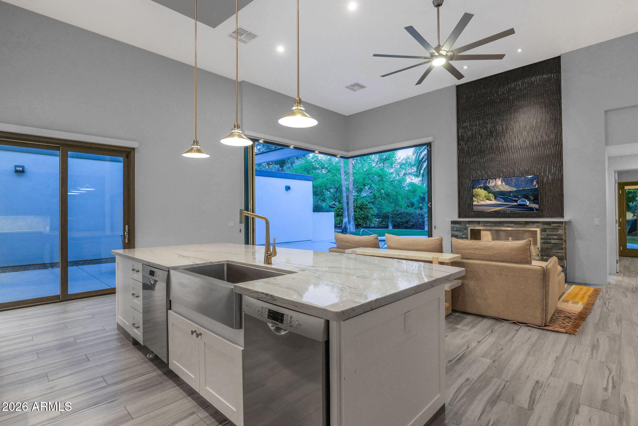 11813 North Blackheath Road Scottsdale, AZ 85254 - Photo 15 of 55 a kitchen with sink cabinets and wooden floor